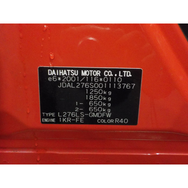 Portier links voor Daihatsu Cuore (2007 - heden) Hatchback 1.0 12V DVVT (1KR-FE)